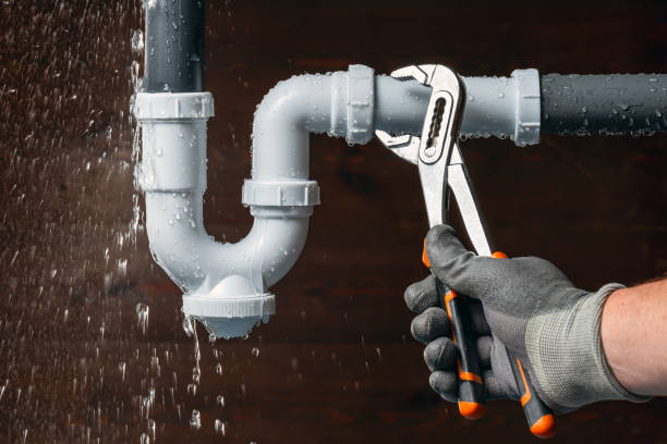 Professional Emergency Plumber technician working in Millis, MA